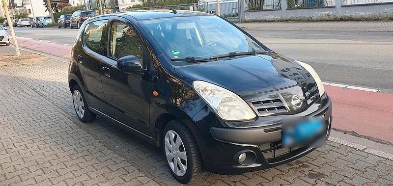 Gebraucht Nissan Pixo 68 PS (50 kW) 2012 Schwarz Kleinwagen