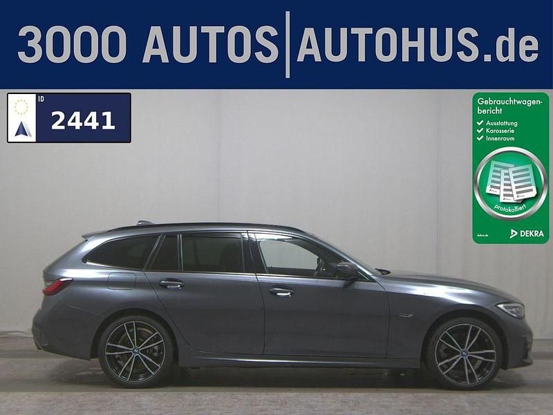 Mineralgrau metallic Gebraucht 2021 BMW 320e M Sport Kombi | 23.680 € (Guter Preis) - Bild 1/4