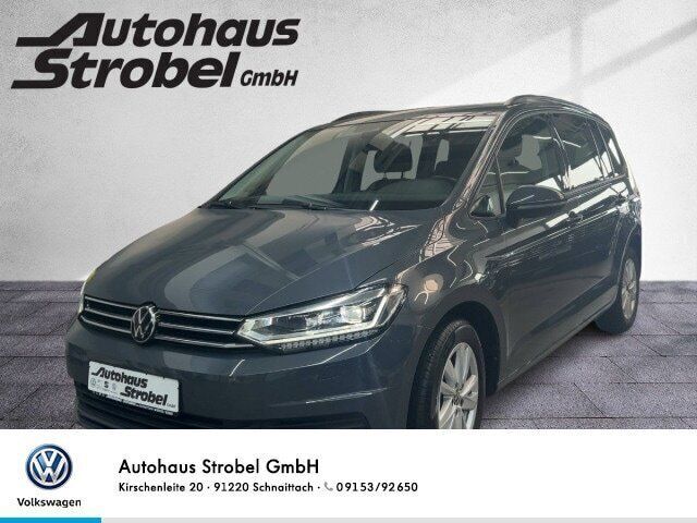 Delfingrau metallic Gebraucht 2020 VW Touran Comfortline Van / Kleinbus | 28.890 € (Etwas zu teuer) - Bild 1/4