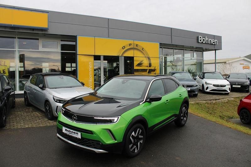 Grün Gebraucht 2022 Opel Mokka Elegance SUV | 16.999 € (Fairer Preis) - Bild 1/4