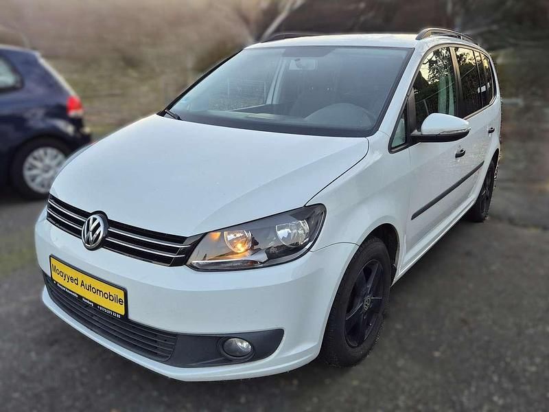 Gebraucht VW Touran Trendline 105 PS (77 kW) 2014 Pure white Van / Kleinbus