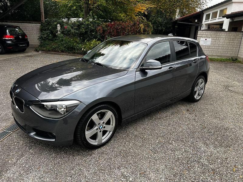 Mineralgrau Gebraucht 2012 BMW 116 Kleinwagen | 5.200 € (Fairer Preis) - Bild 1/4