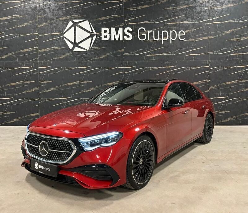 Manufaktur hyacinth rot Gebraucht 2023 Mercedes E220 AMG Limousine | 67.495 € - Bild 1/4