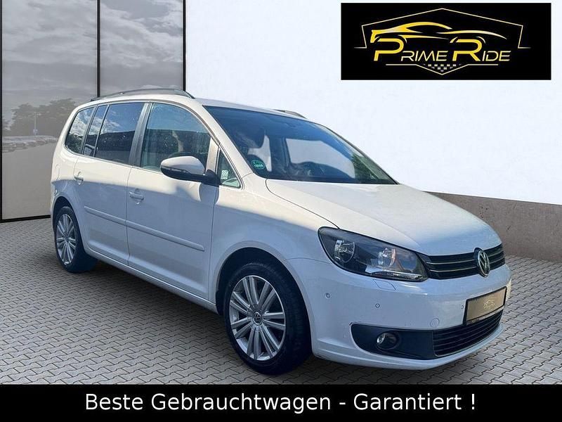 Weiß Gebraucht 2013 VW Touran Comfortline Van / Kleinbus | 6.980 € (Etwas zu teuer) - Bild 1/4