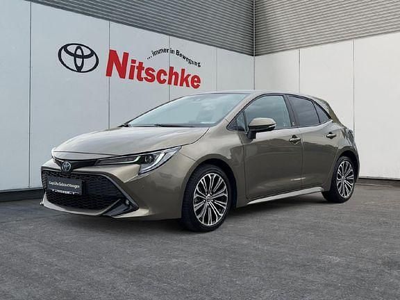 Manganbronze Gebraucht 2022 Toyota Corolla Team Limousine | 23.490 € (Fairer Preis) - Bild 1/4