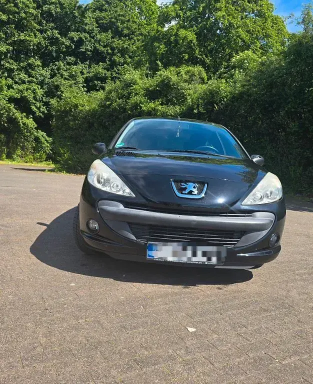 Gebraucht Peugeot 206 60 PS (44 kW) 2010 Schwarz Limousine