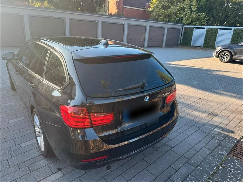 Second-hand BMW 318 143 CP (105 kW) 2015 Negru Break