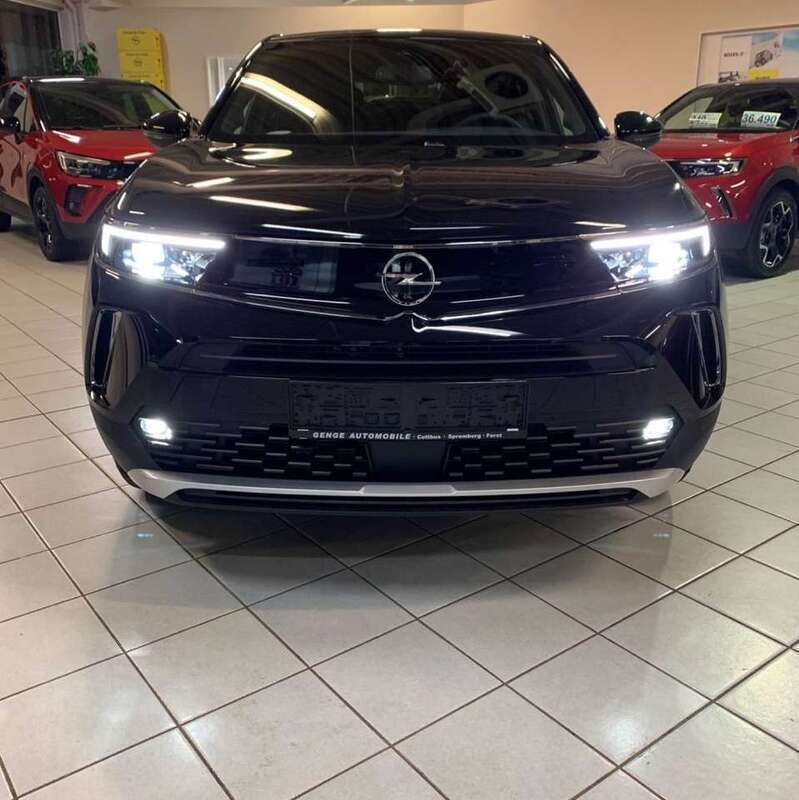 Gebraucht Opel Mokka-e Ultimate 100 kW (136 PS) 2023 Diamant schwarz metallic SUV