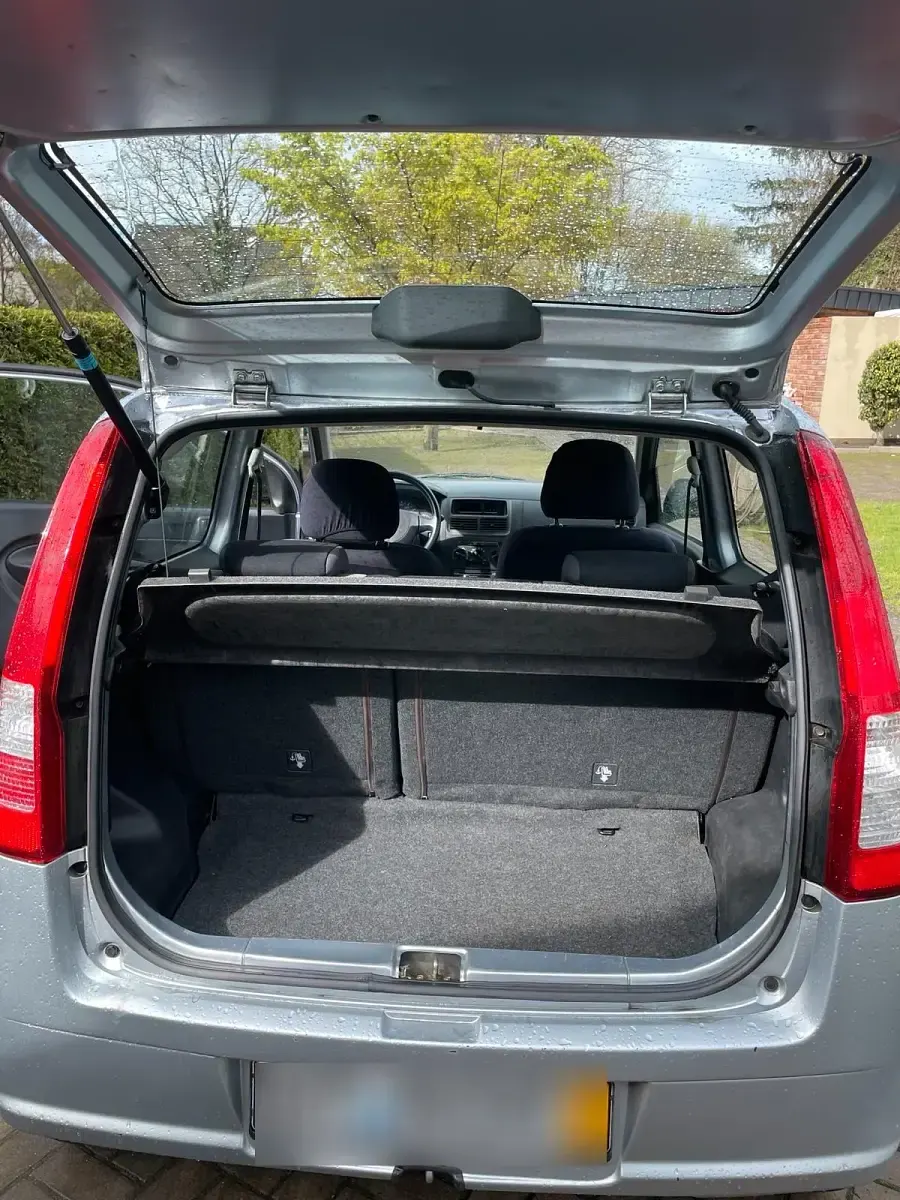 Gebraucht Daihatsu Cuore 58 PS (42 kW) 2006 Silber Kleinwagen