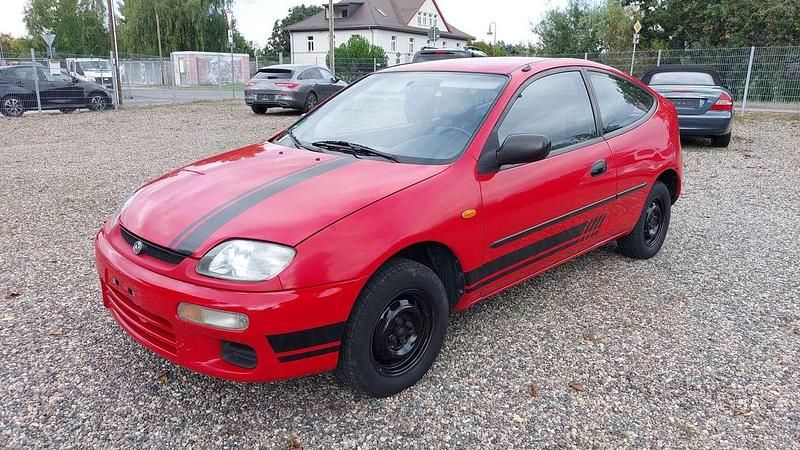 Gebraucht Mazda 323C 73 PS (53 kW) 1995 Rot Limousine