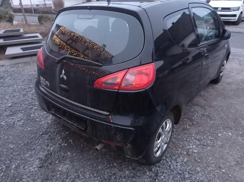 Gebraucht Mitsubishi Colt Inform 75 PS (55 kW) 2006 Schwarz Kleinwagen