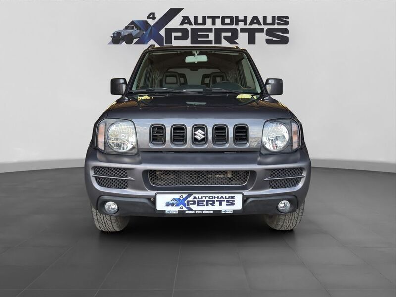 Grau Gebraucht 2011 Suzuki Jimny Style SUV | 12.500 € (Fairer Preis) - Bild 1/4