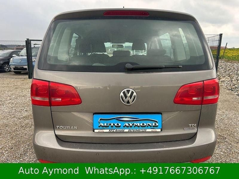 Second-hand VW Touran 105 CP (77 kW) 2011 Gri Monovolum