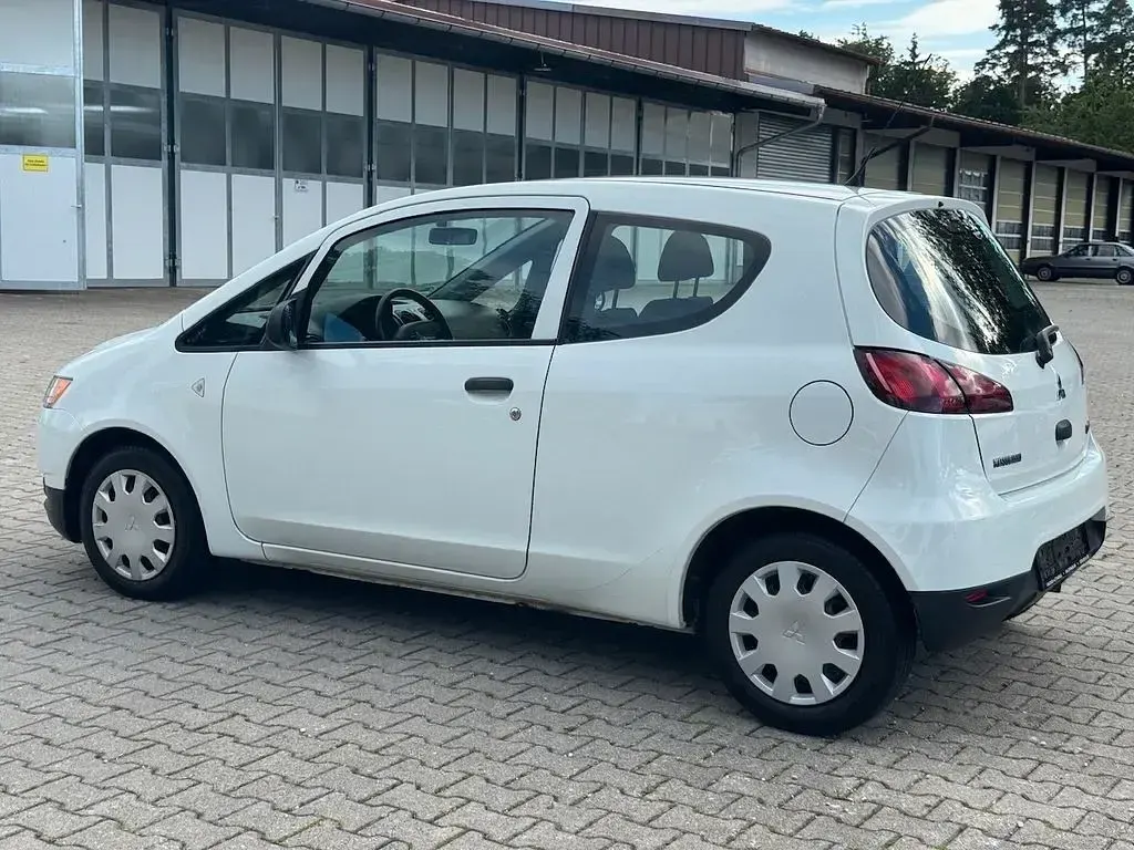 Gebraucht Mitsubishi Colt 75 PS (55 kW) 2013 Weiß Kleinwagen