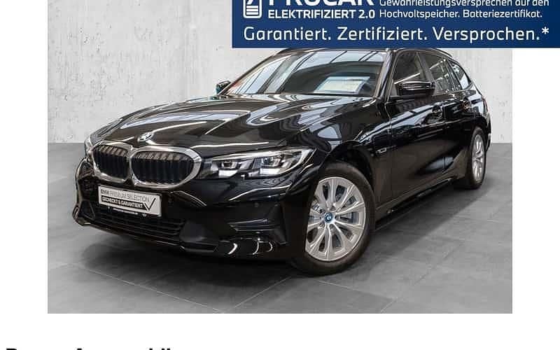 Schwarz Gebraucht 2022 BMW 320e Advantage Kombi | 28.490 € (Fairer Preis) - Bild 1/4