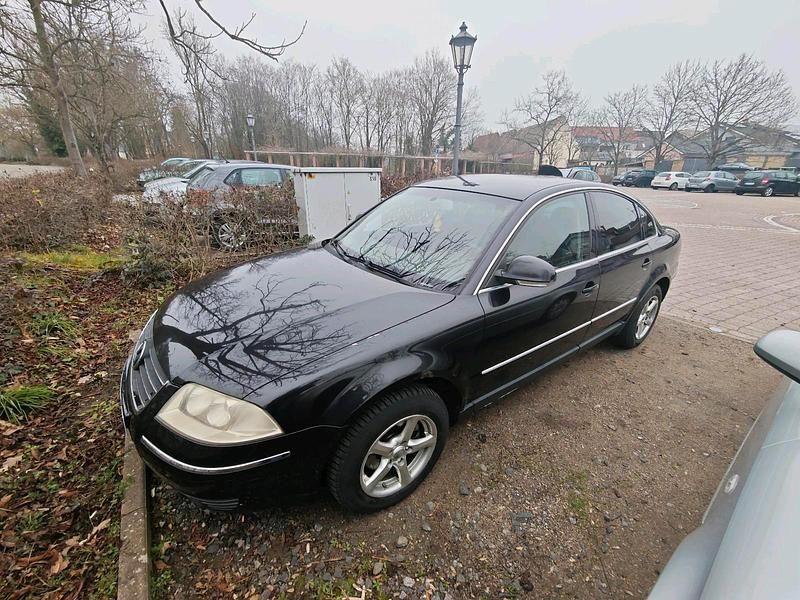 Second-hand VW Passat 131 CP (96 kW) 2004 Negru Berlinǎ