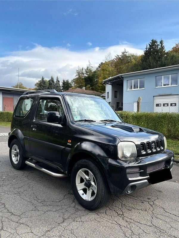 Schwarz Gebraucht 2007 Suzuki Jimny SUV | 4.900 € (Fairer Preis) - Bild 1/4