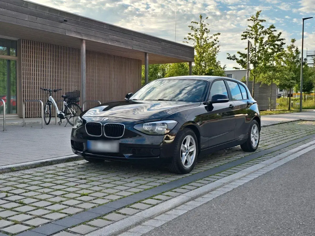 Gebraucht BMW 116 116 PS (85 kW) 2012 Schwarz Kleinwagen