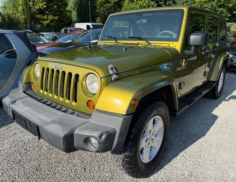 Grün Gebraucht 2007 Jeep Wrangler Unlimited Sahara SUV | 12.490 € (Superpreis) - Bild 1/4