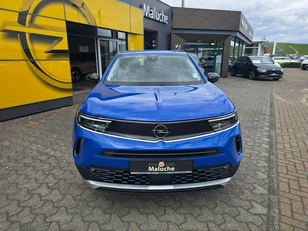 Gebraucht Opel Mokka-e Elegance 100 kW (136 PS) 2023 Perl blau/voltaik blau SUV