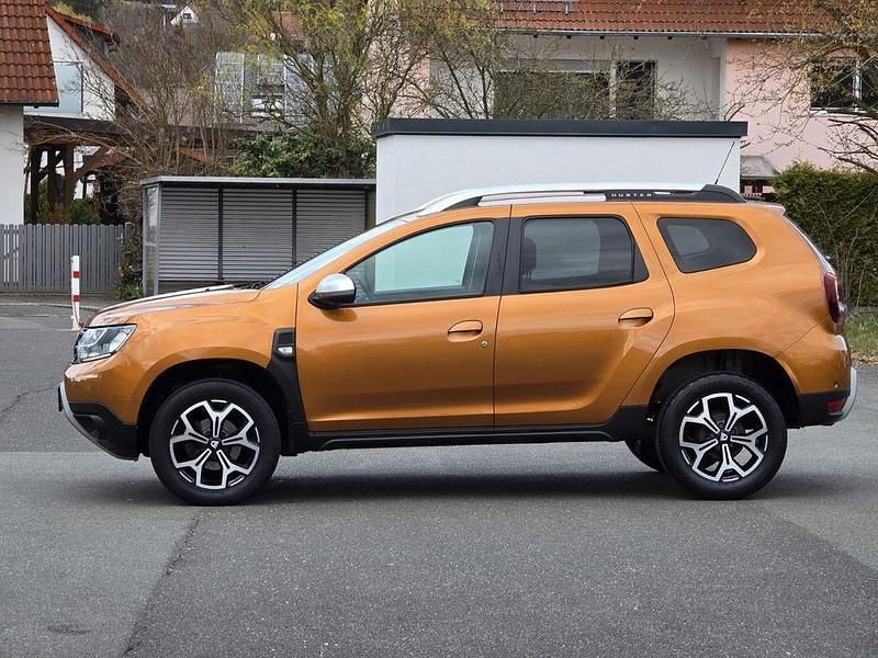 Używany Dacia Duster Prestige 125 KM (91 kW) 2018 Pomarańczowy SUV