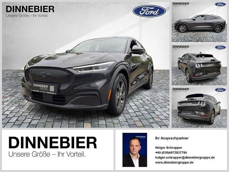 Grau (metallic) Gebraucht 2022 Ford Mustang Mach-E Basis SUV | 31.990 € (Fairer Preis) - Bild 1/4