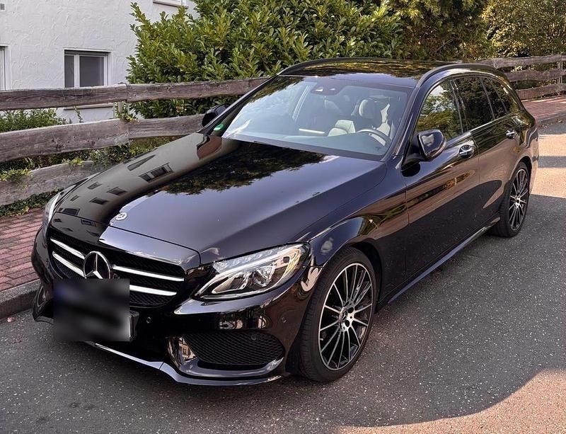 Schwarz Gebraucht 2018 Mercedes C200 AMG line Kombi | 28.000 € (Etwas zu teuer) - Bild 1/4