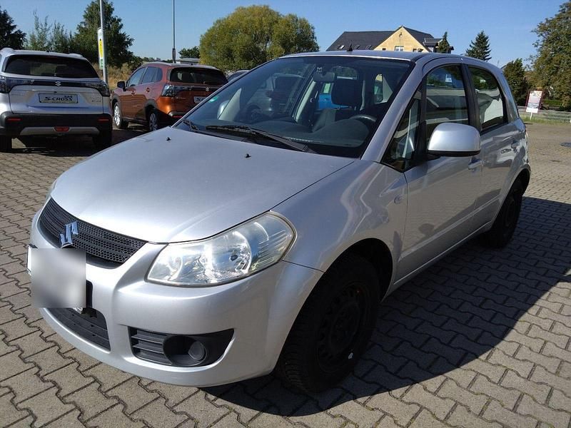 Silber Gebraucht 2006 Suzuki SX4 Club Limousine | 3.555 € (Fairer Preis) - Bild 1/4