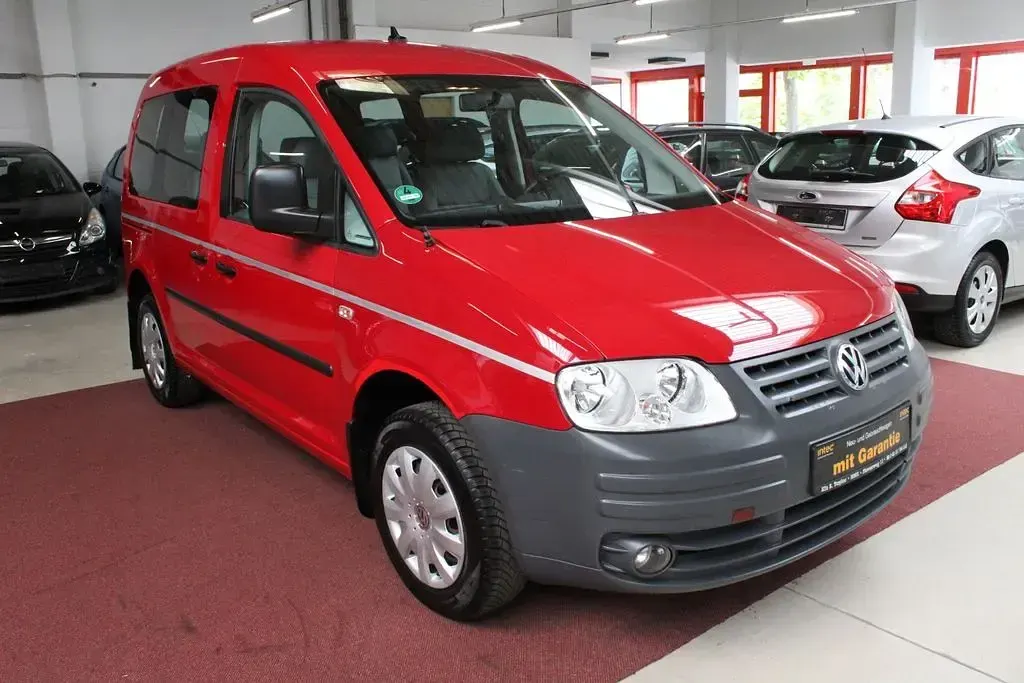 Używany VW Caddy 75 KM (55 kW) 2009 Czerwony Minivan