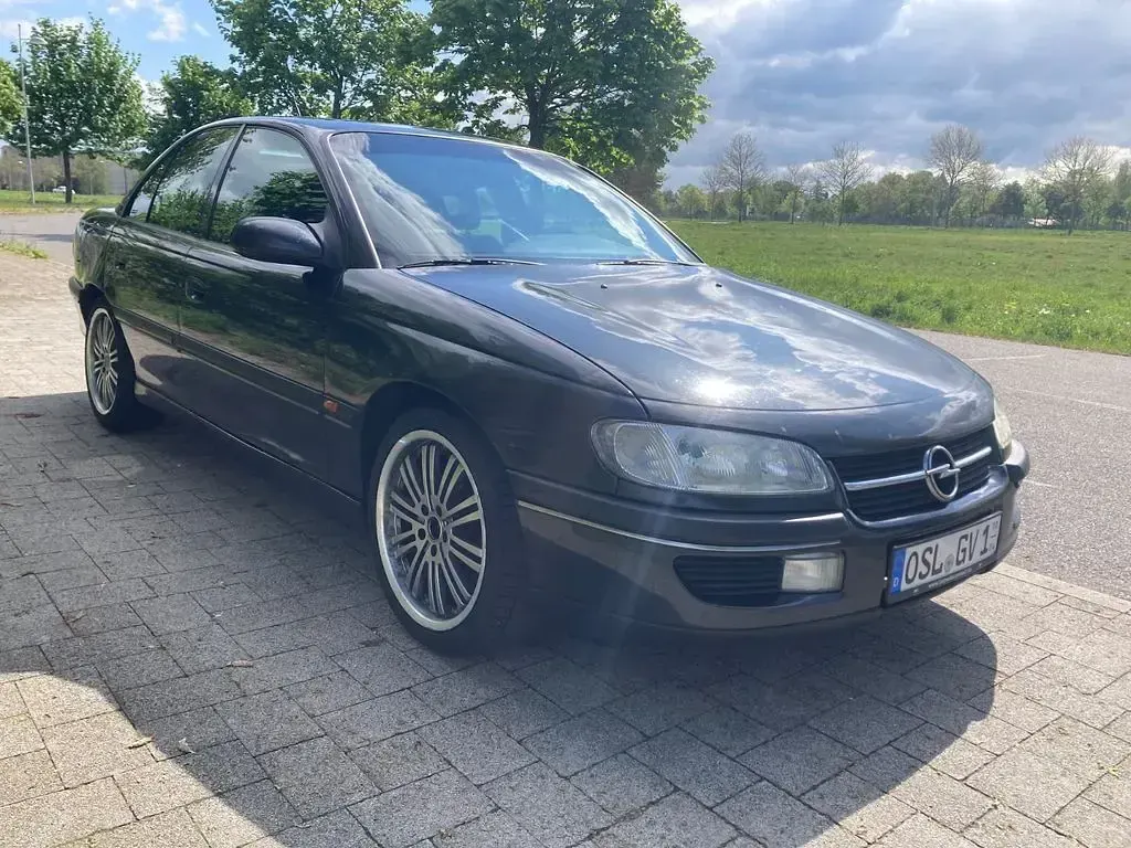 Second-hand Opel Omega 211 CP (155 kW) 1997 Negru Berlinǎ