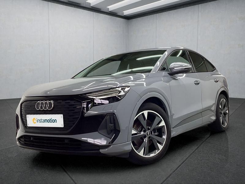 Grau Gebraucht 2022 Audi Q4 Sportback e-tron SUV | 28.799 € (Teuer) - Bild 1/4