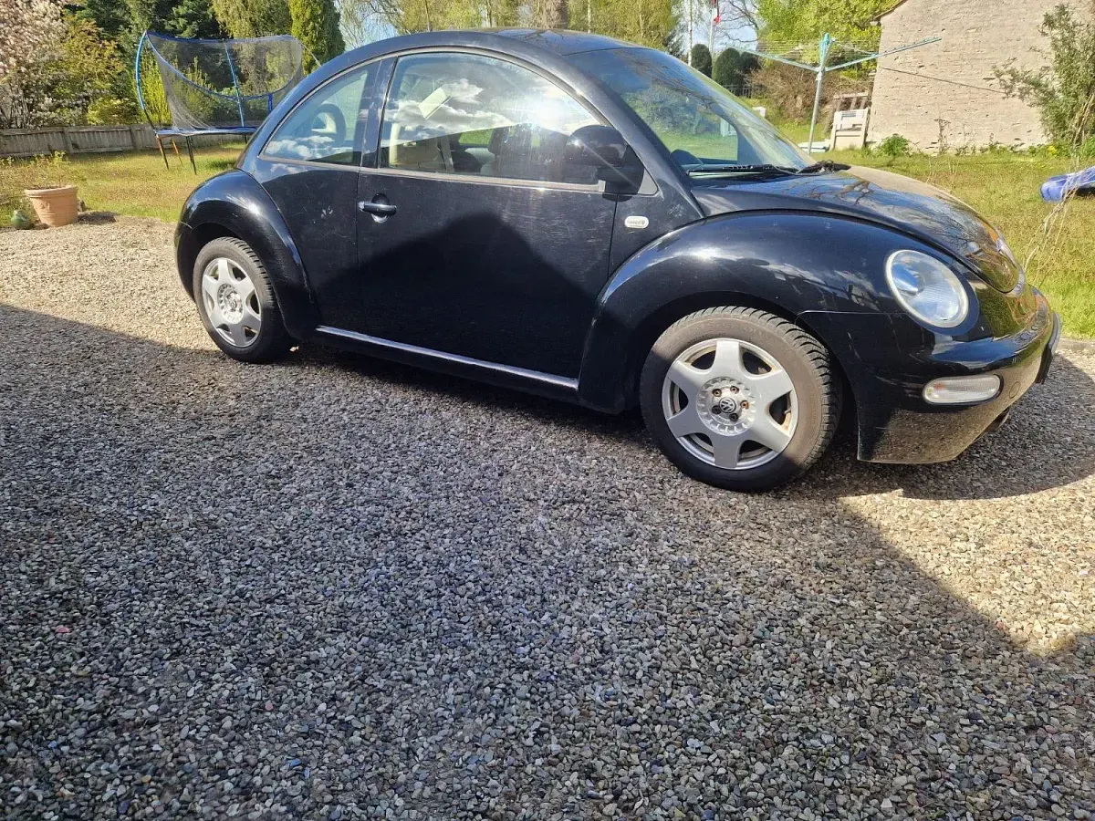Gebraucht VW New Beetle 85 PS (62 kW) 2000 Schwarz Kleinwagen