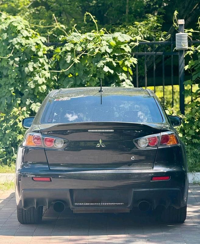 Gebraucht Mitsubishi Lancer 350 PS (257 kW) 2014 Schwarz Limousine