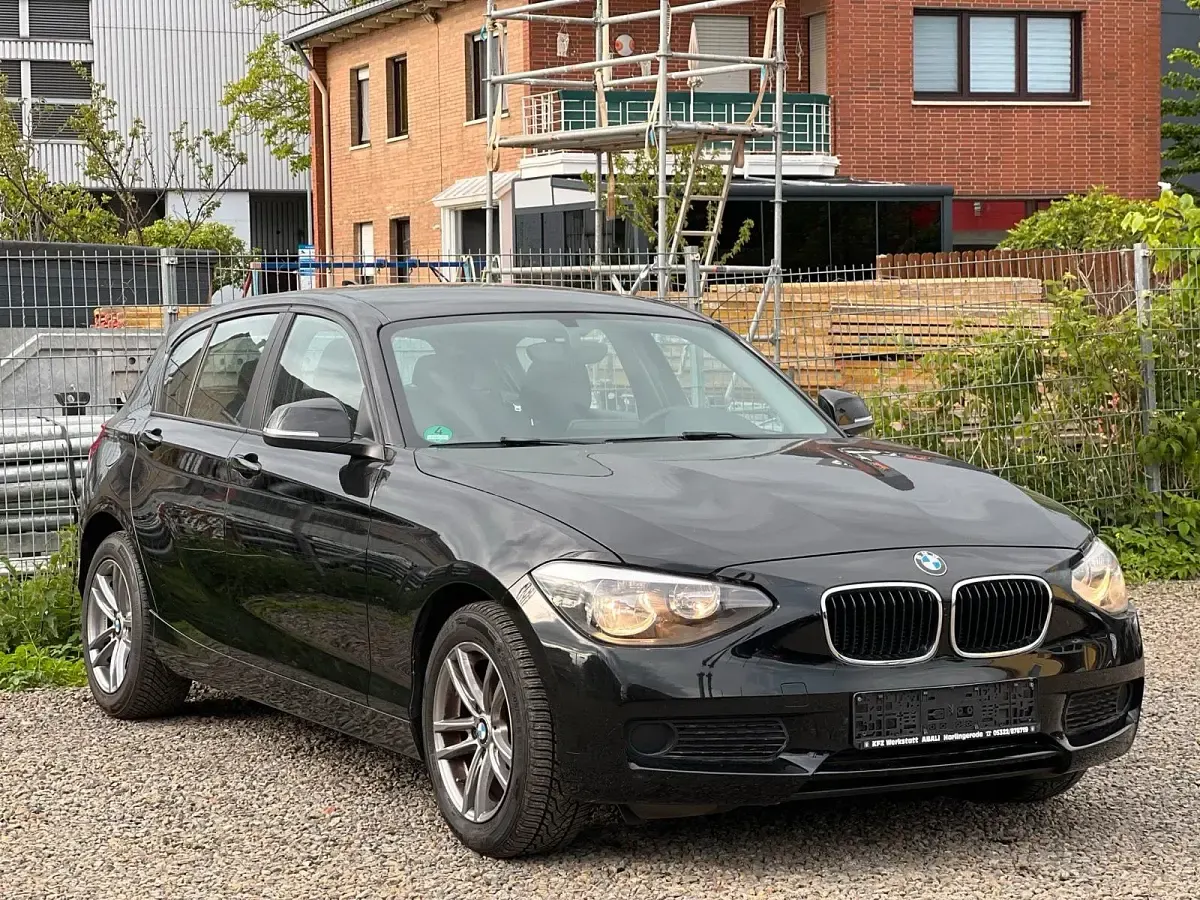 Second-hand BMW 116 136 CP (100 kW) 2014 Negru Hatchback