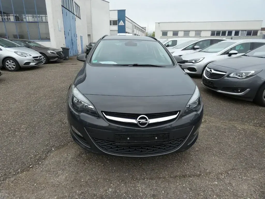 Second-hand Opel Astra Edition 140 CP (102 kW) 2014 Gri Break