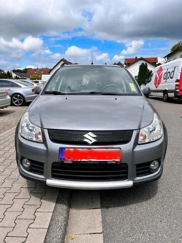 Grau Gebraucht 2009 Suzuki SX4 SUV | 4.500 € (Teuer) - Bild 1/4