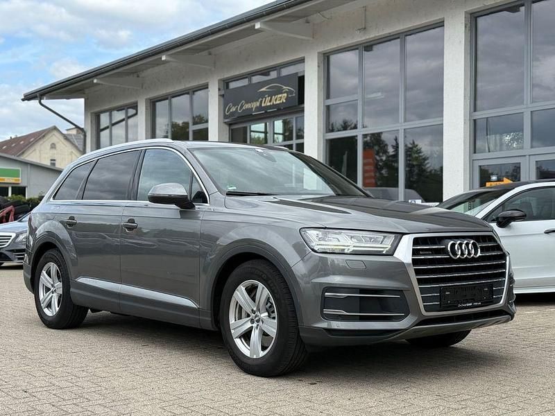 Grau Gebraucht 2015 Audi Q7 Sport SUV | 27.499 € (Teuer) - Bild 1/4