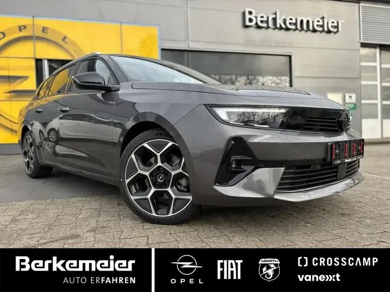 Vulkan grau Gebraucht 2024 Opel Astra GS Line Kombi | 31.925 € - Bild 1/4