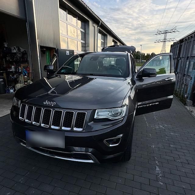 Silber Gebraucht 2015 Jeep Grand Cherokee Overland SUV | 17.800 € (Fairer Preis) - Bild 1/4