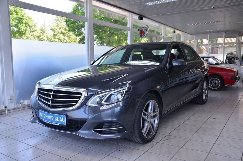 Tenoritgrau metalliclack Gebraucht 2014 Mercedes E300 AMG Limousine | 19.490 € (Fairer Preis) - Bild 1/4