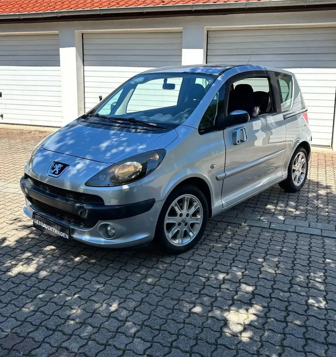 Gebraucht Peugeot 1007 109 PS (80 kW) 2008 Silber Van / Kleinbus