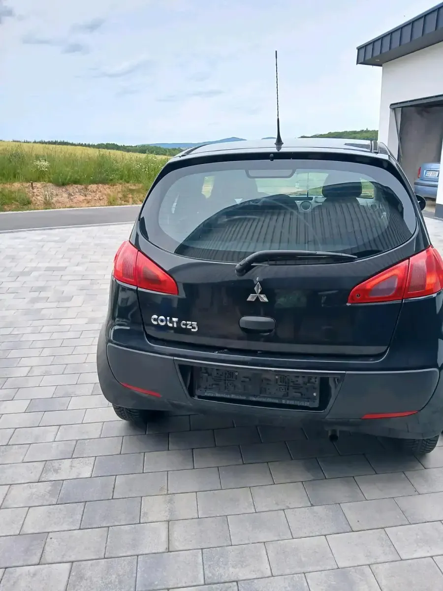 Gebraucht Mitsubishi Space Star 75 PS (55 kW) 2005 Schwarz Kleinwagen