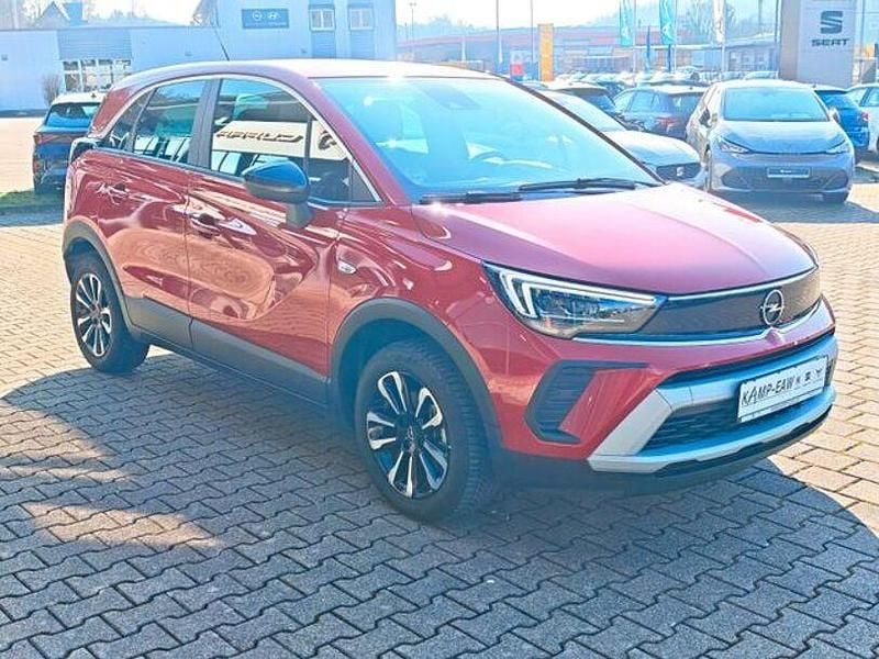 Gebraucht Opel Crossland X Elegance 110 PS (80 kW) 2023 Lackierung peperoncino red/metal (metallic) SUV