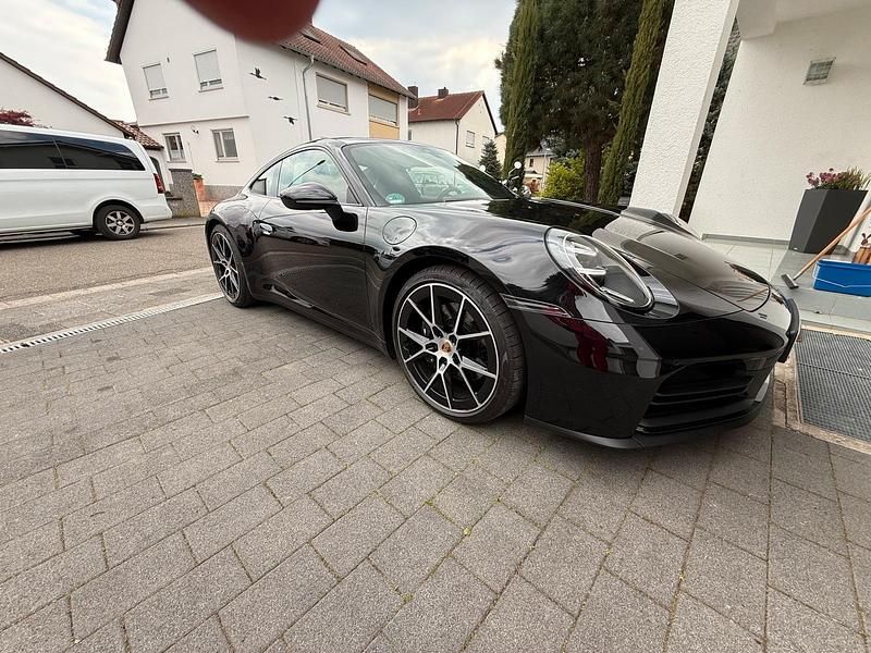Gebraucht Porsche 992 394 PS (289 kW) 2025 Schwarz Coupé