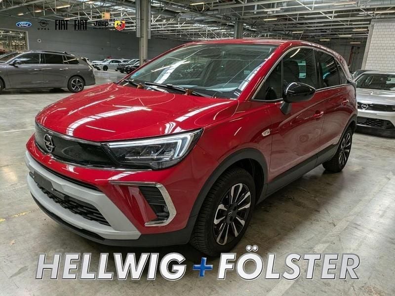 Peperoncino red/metallic klarl Gebraucht 2024 Opel Crossland Elegance SUV | 22.490 € (Fairer Preis) - Bild 1/4