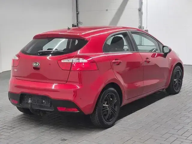 Gebraucht Kia Rio EX 86 PS (63 kW) 2013 Signal red (metallic) Kleinwagen