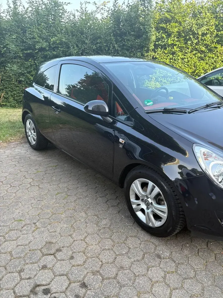 Gebraucht Opel Corsa 86 PS (63 kW) 2011 Schwarz Kleinwagen