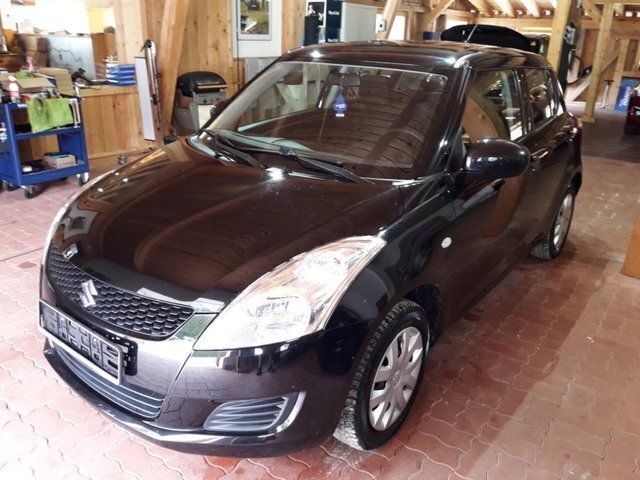 Gebraucht Suzuki Swift Club 94 PS (69 kW) 2013 Schwarz metallic Kleinwagen