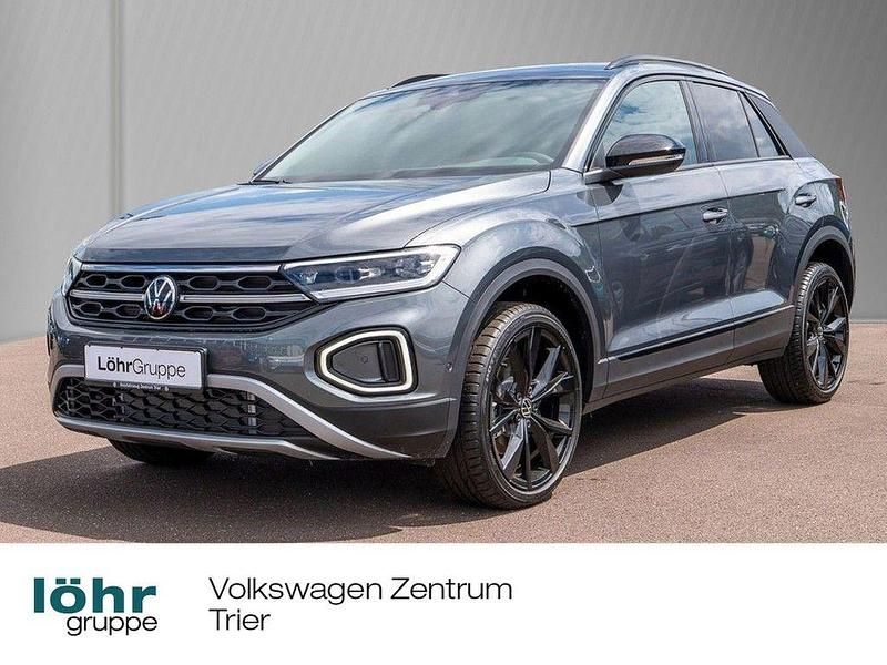 Indiumgrau metallic Gebraucht 2025 VW T-Roc Style SUV | 35.460 € (Etwas zu teuer) - Bild 1/4