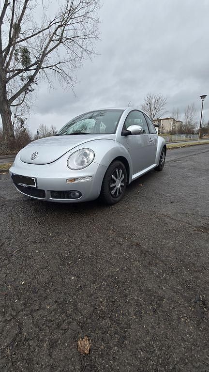 Gebraucht VW New Beetle 102 PS (75 kW) 2010 Silber Kleinwagen